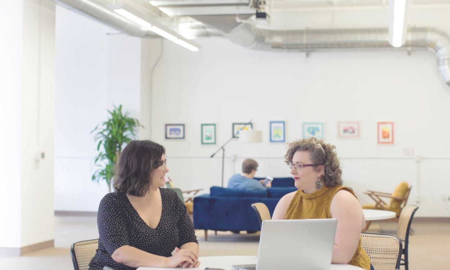 Howtomanual office workspace in Burlingame showing collaborative budget planning environment